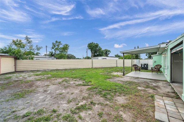 view of yard with a patio area