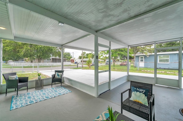 sunroom / solarium with a healthy amount of sunlight