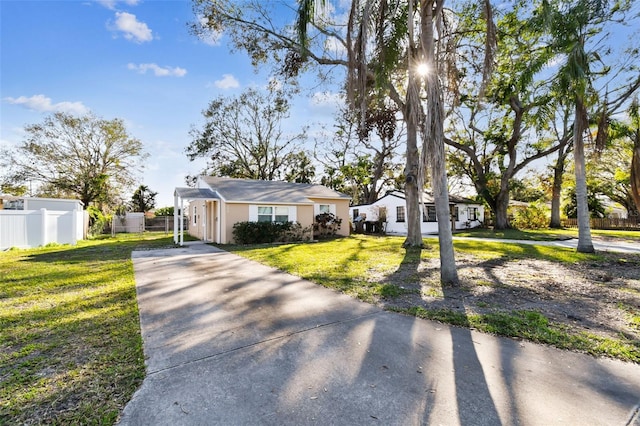 single story home with a front yard