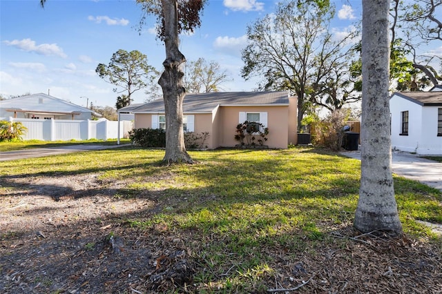 single story home featuring a front yard and central air condition unit