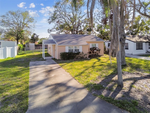 view of front of property with a front lawn