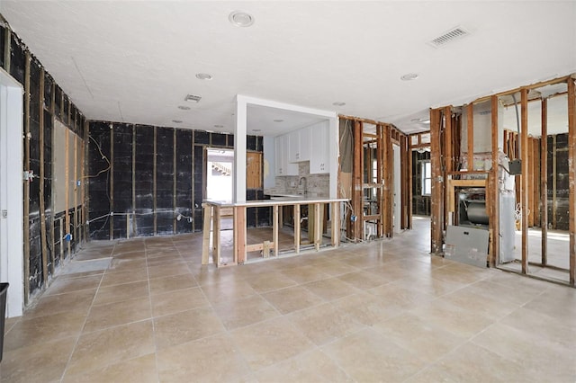 interior space with white cabinetry