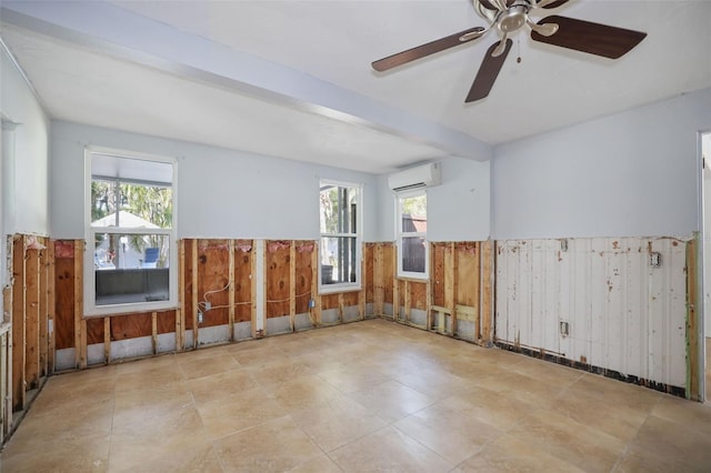 empty room with a wall mounted AC, beam ceiling, and wood walls