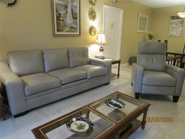 living room featuring light tile patterned flooring