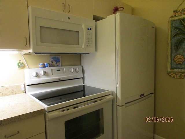 kitchen with white appliances