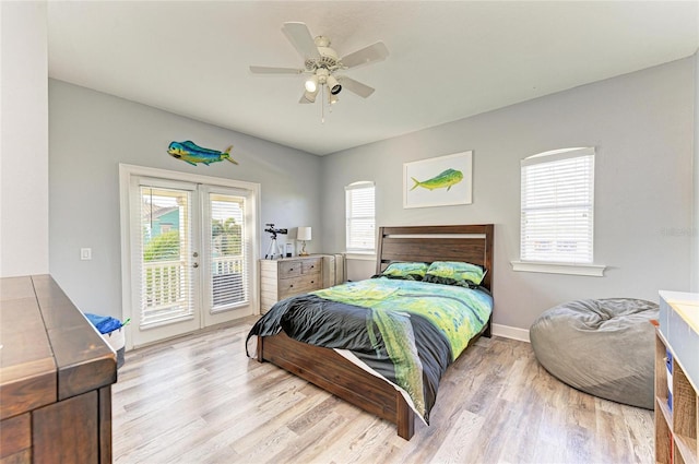 bedroom with access to outside, french doors, ceiling fan, and light wood-type flooring