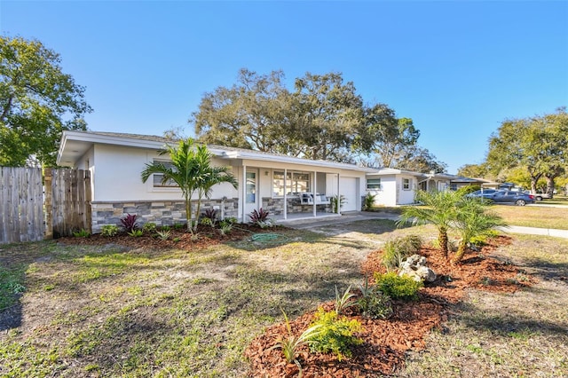 ranch-style house with a front lawn