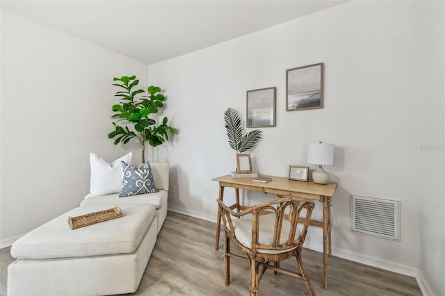 living area featuring hardwood / wood-style flooring