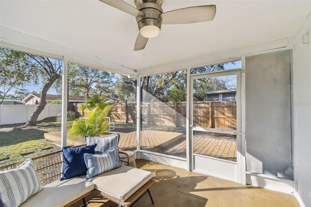 sunroom / solarium with ceiling fan