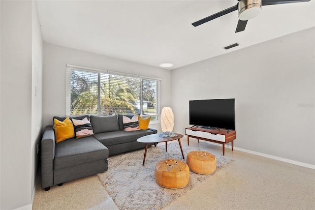 living room featuring ceiling fan