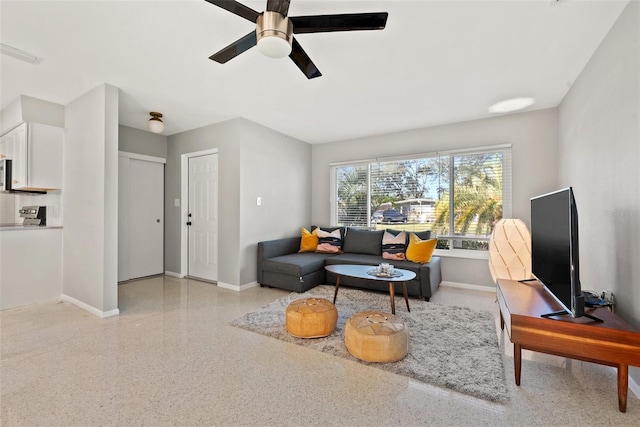 living room with ceiling fan