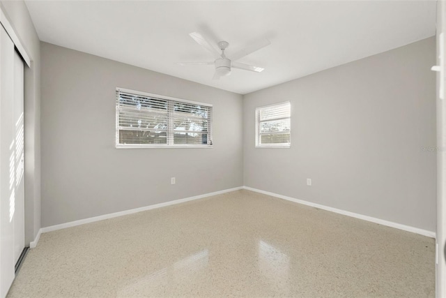 spare room featuring ceiling fan