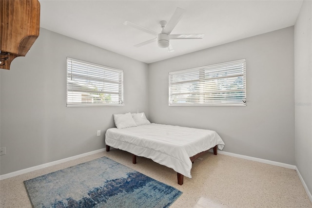 bedroom featuring ceiling fan