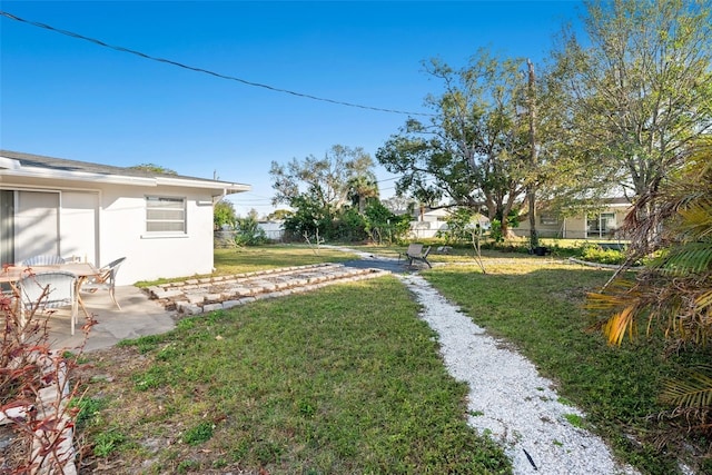 view of yard with a patio area