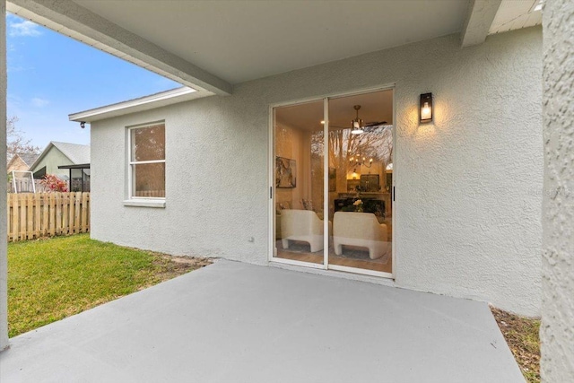 property entrance with a patio area