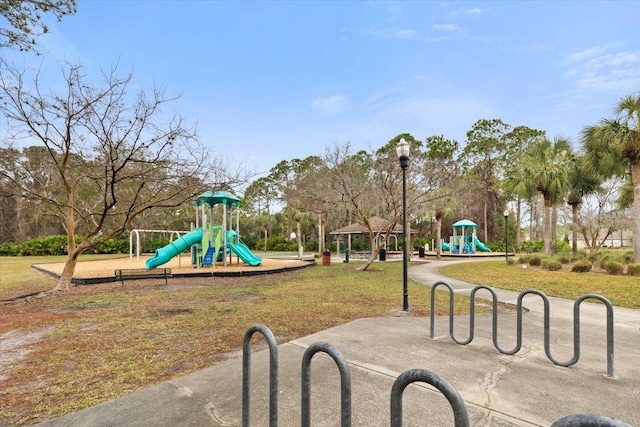 view of playground featuring a gazebo and a lawn