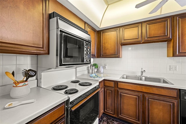 kitchen featuring sink, white electric range, ceiling fan, black dishwasher, and decorative backsplash