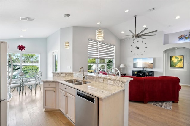 kitchen with sink, dishwasher, refrigerator, light hardwood / wood-style floors, and decorative light fixtures