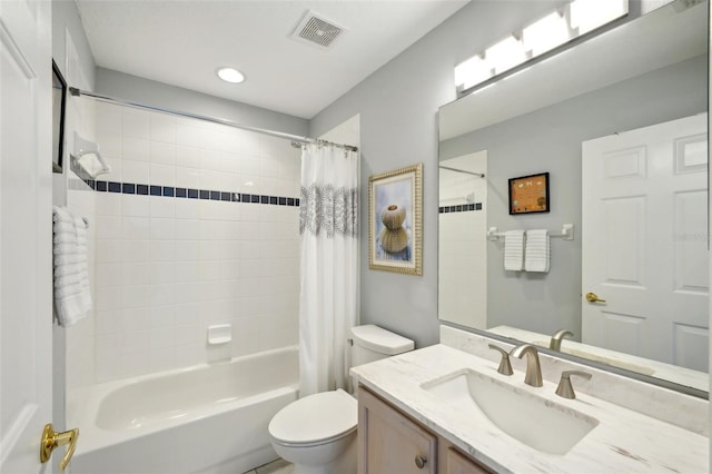 full bathroom featuring shower / bathtub combination with curtain, vanity, and toilet