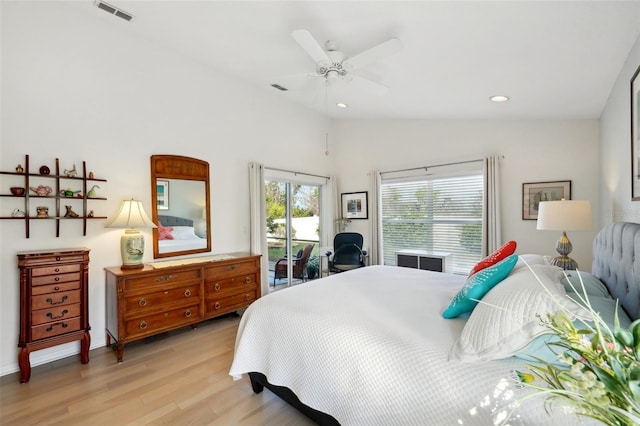 bedroom with vaulted ceiling, ceiling fan, light hardwood / wood-style floors, and access to outside