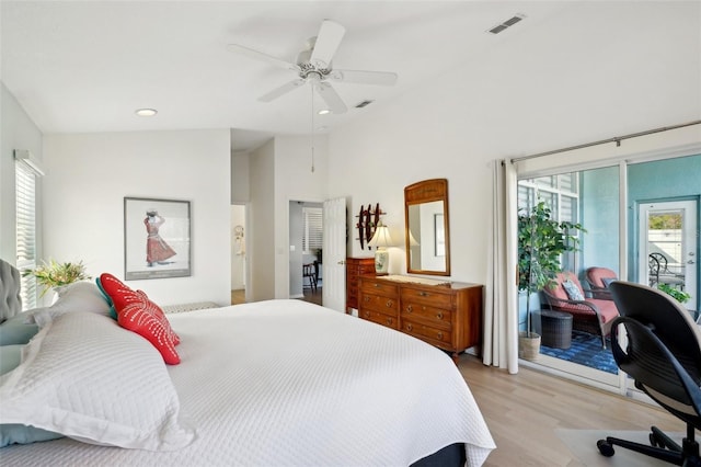 bedroom with ceiling fan, light hardwood / wood-style flooring, and access to outside