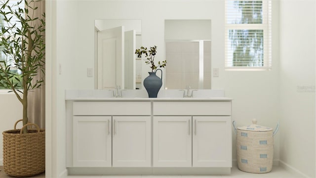 bathroom with vanity and a shower with shower door