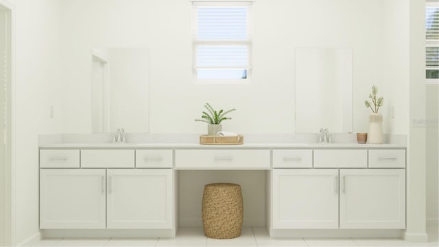 bathroom with vanity and a wealth of natural light