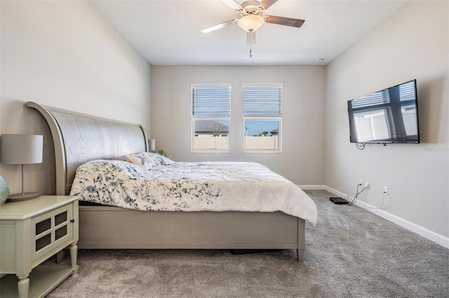 bedroom featuring light colored carpet and ceiling fan