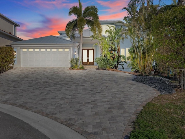 view of front of home with a garage