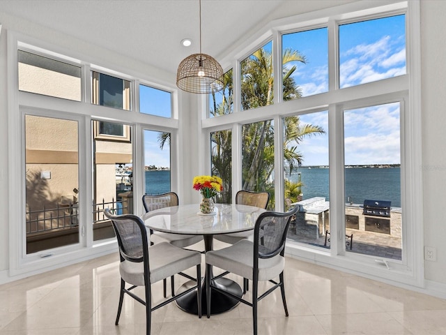 sunroom with a water view