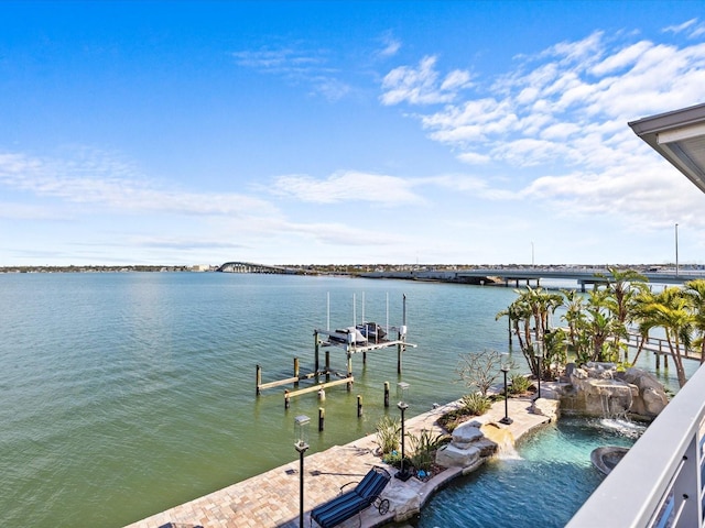 view of dock with a water view