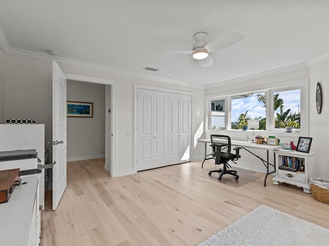 office area with ornamental molding, ceiling fan, and light hardwood / wood-style flooring