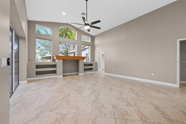 unfurnished living room with light tile patterned flooring, ceiling fan, and high vaulted ceiling