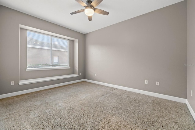 carpeted empty room with ceiling fan