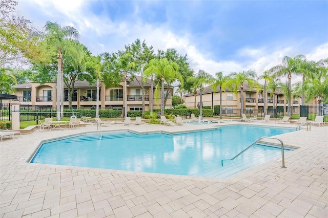 view of swimming pool with a patio