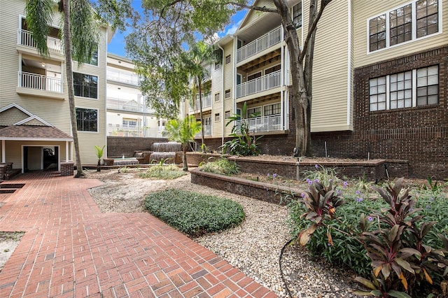 view of community with a patio