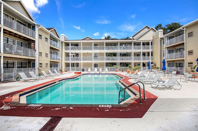 view of pool featuring a patio