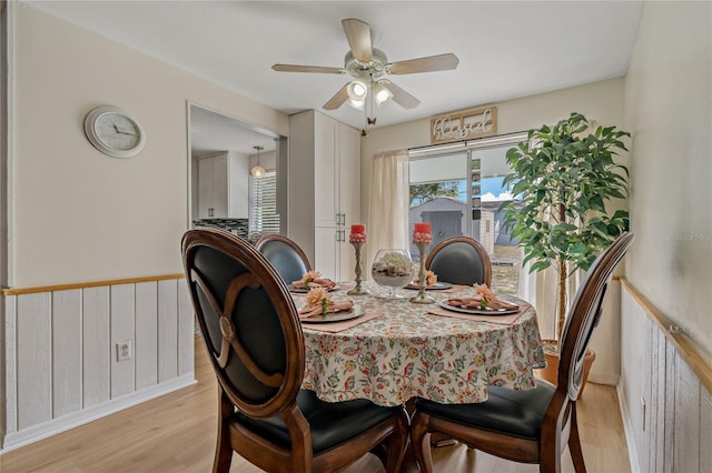 dining room featuring ceiling fan and light wood-type flooring