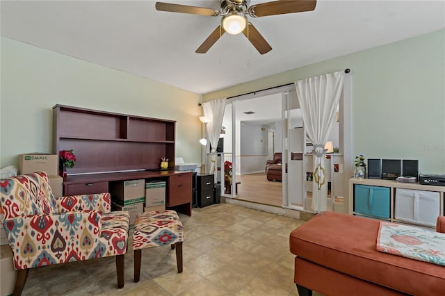 interior space featuring ceiling fan