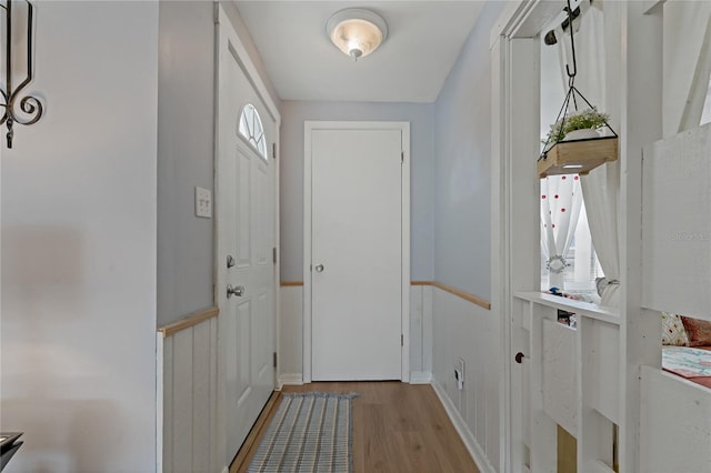 entryway with light hardwood / wood-style floors