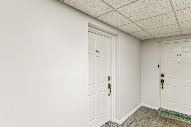 interior space featuring a paneled ceiling