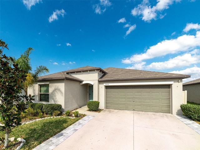 view of front of property featuring a garage