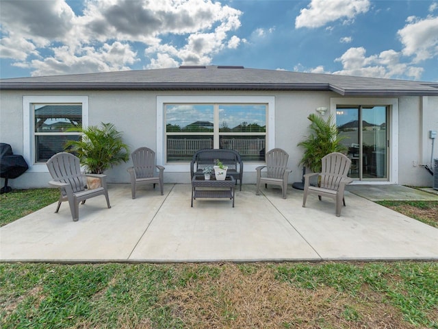 view of patio with a grill