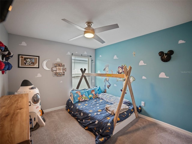 bedroom featuring ceiling fan and carpet flooring