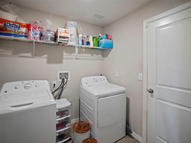 laundry area with washer and clothes dryer