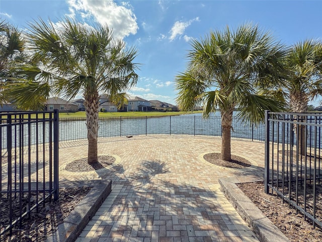 view of patio / terrace with a water view