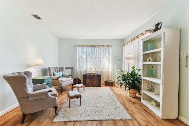 sitting room with light wood-type flooring