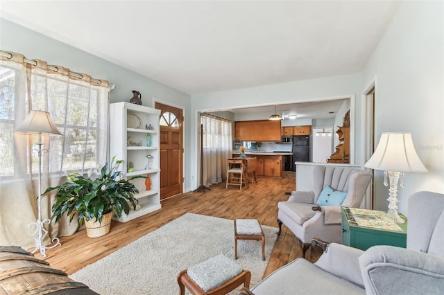 living room with light wood-type flooring