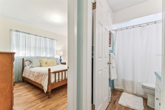 bedroom with light hardwood / wood-style floors