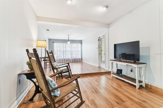 living area featuring light hardwood / wood-style floors